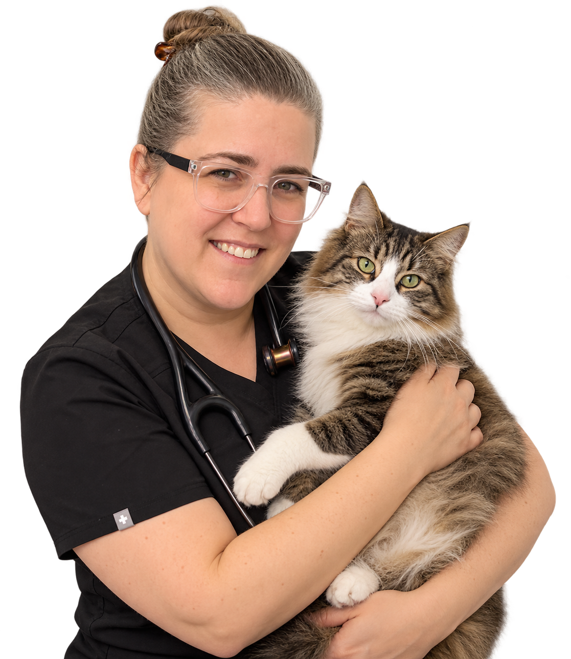 Dr. Truli smiling while holding a gray and white cat.